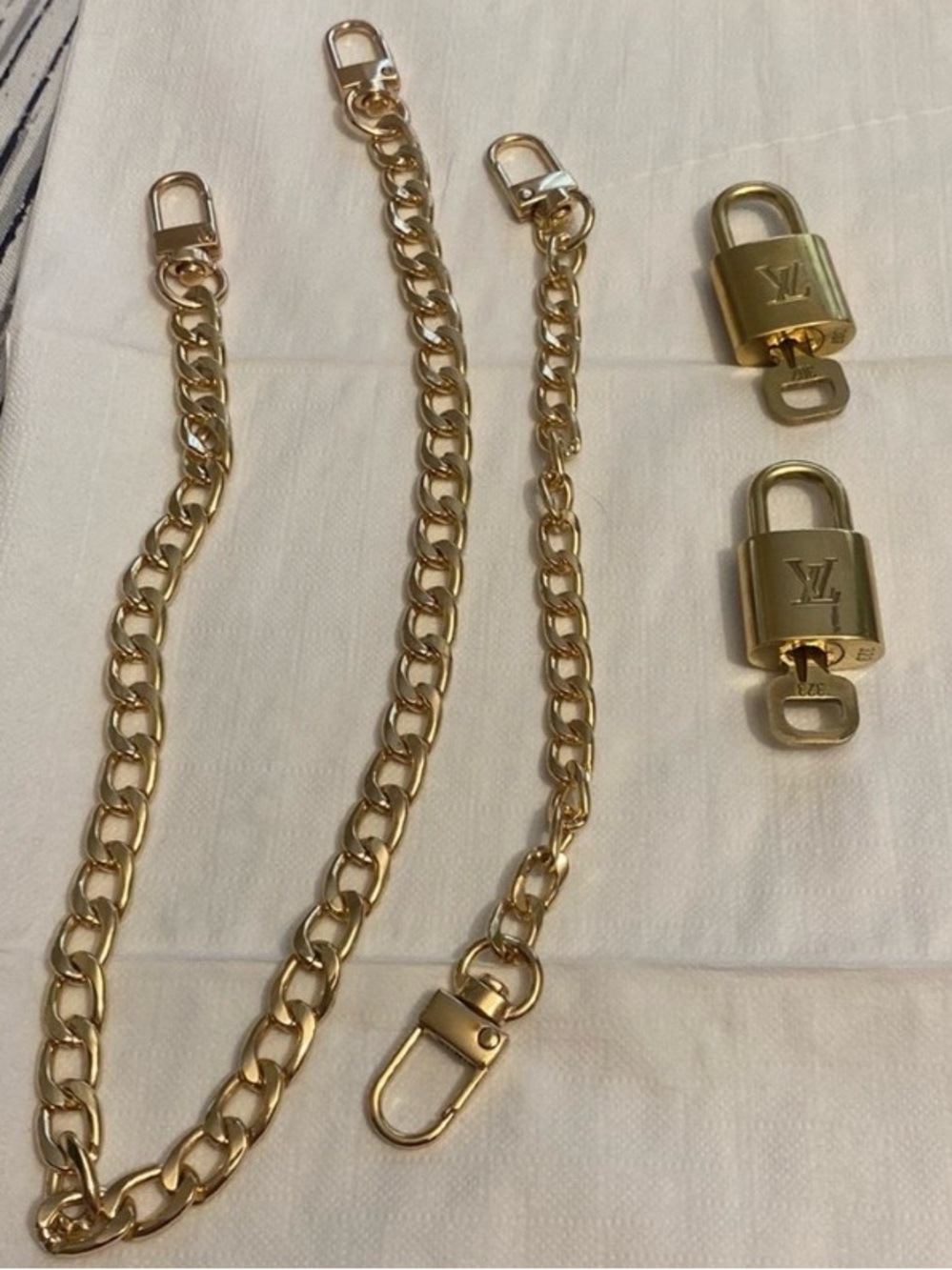 Louis Vuitton box & locks & keys #307 & 323  w/unbranded chain 18” & bracelet 8”
